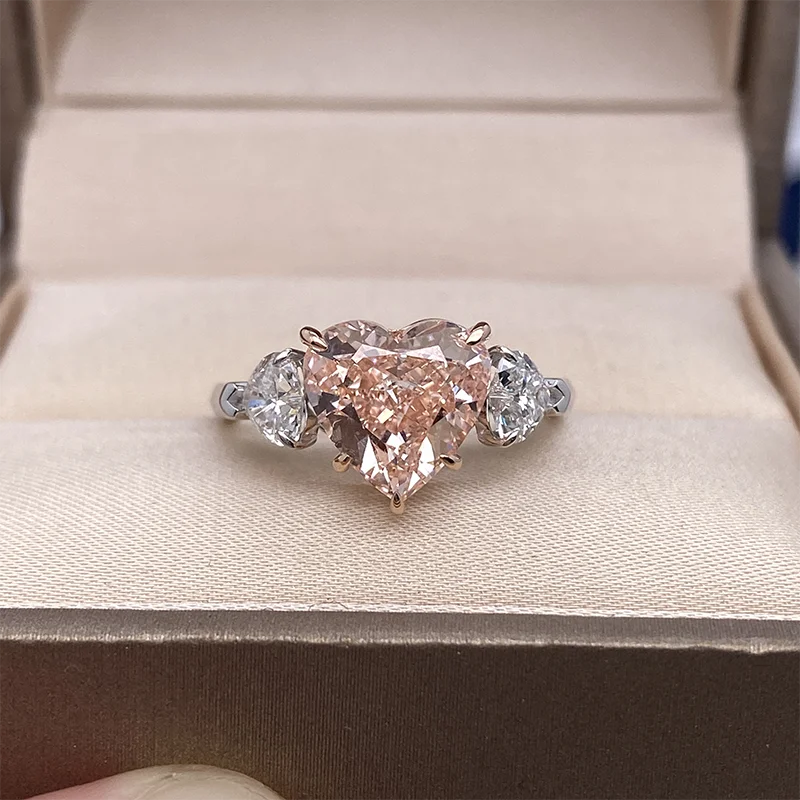 Two-tone gold ring with pink heart-shaped lab-grown diamond