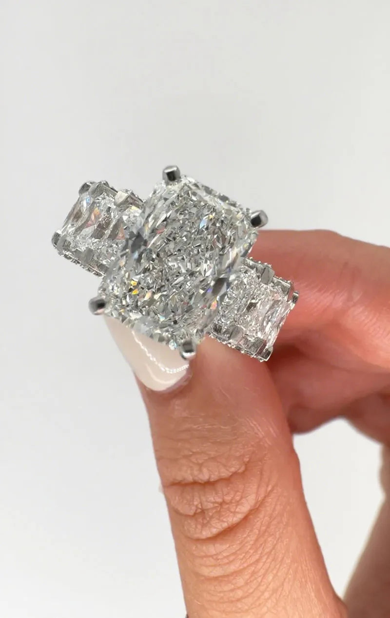 Radiant diamond engagement ring with diamond detailing