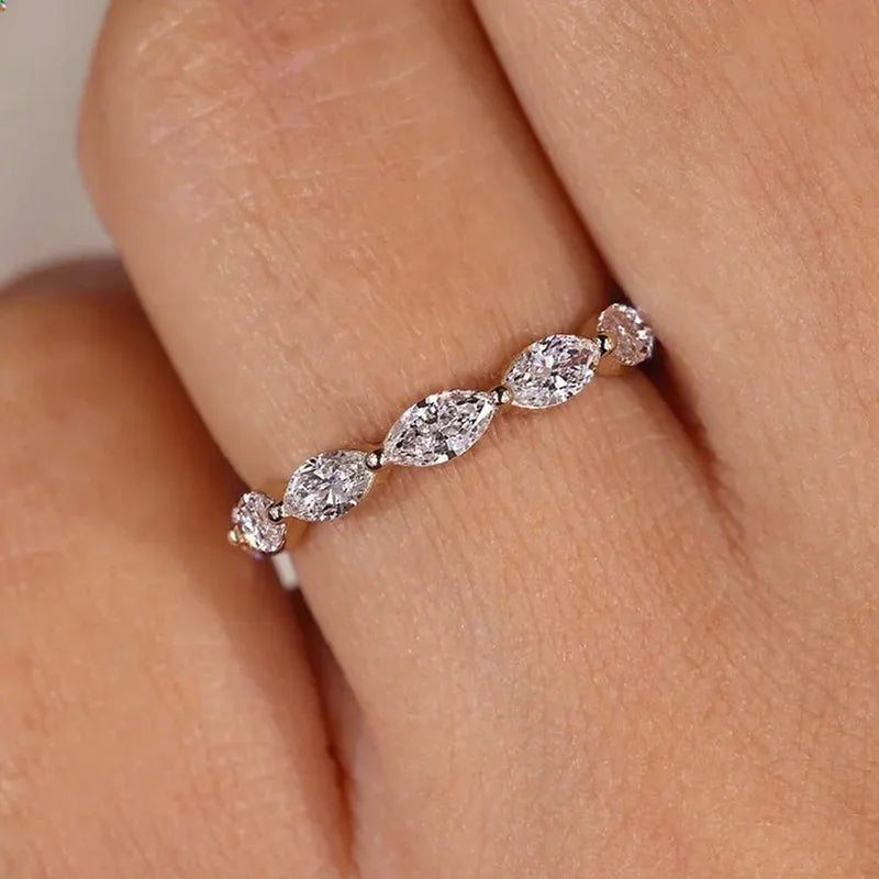 Low-profile shared-prong marquise diamond ring