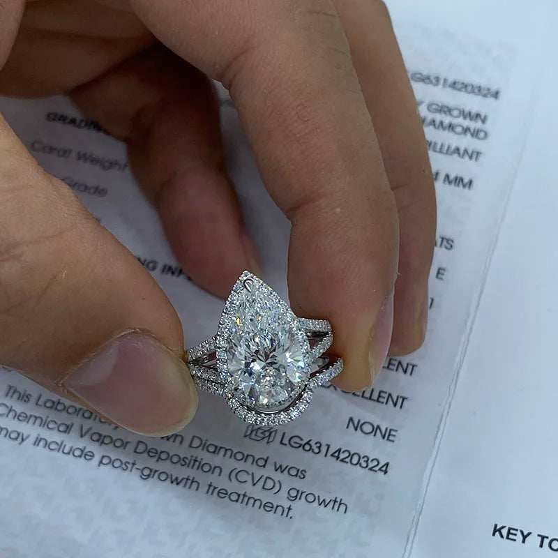 Four carat pear diamond engagement ring with wedding band