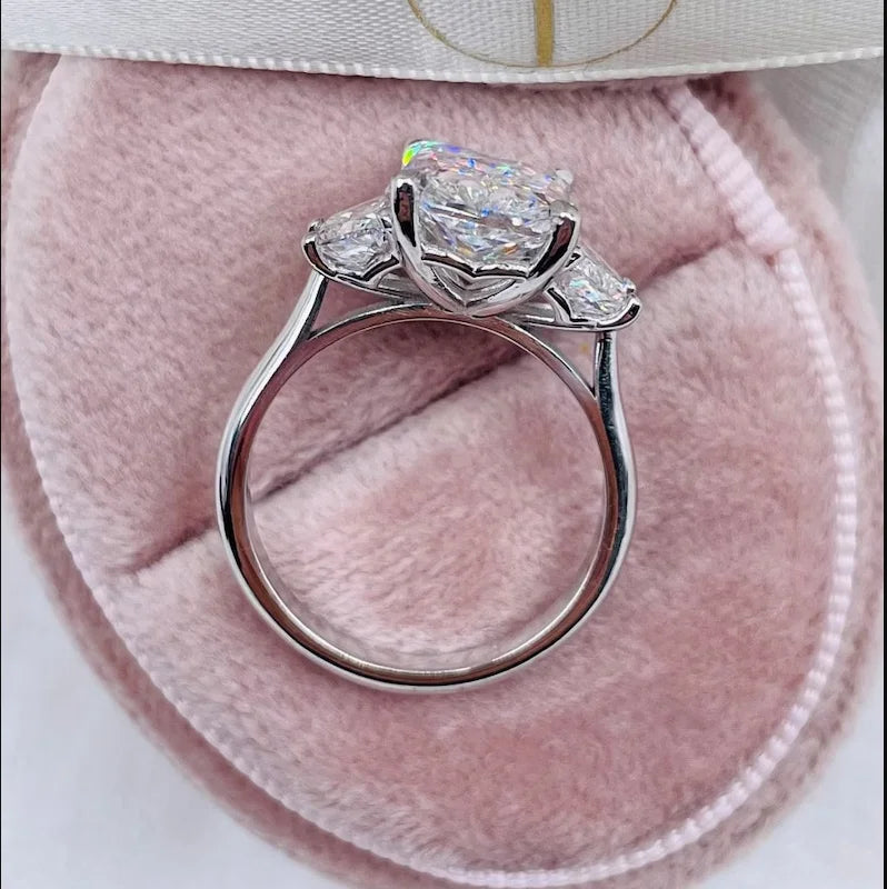 Radiant-cut lab-grown diamond ring with diamond side stones