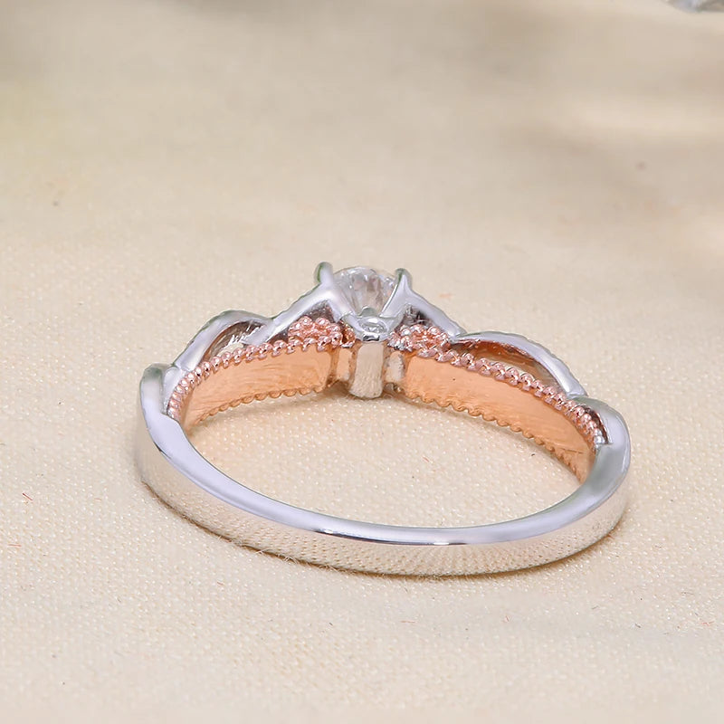Prong-set round diamond ring in two-tone gold