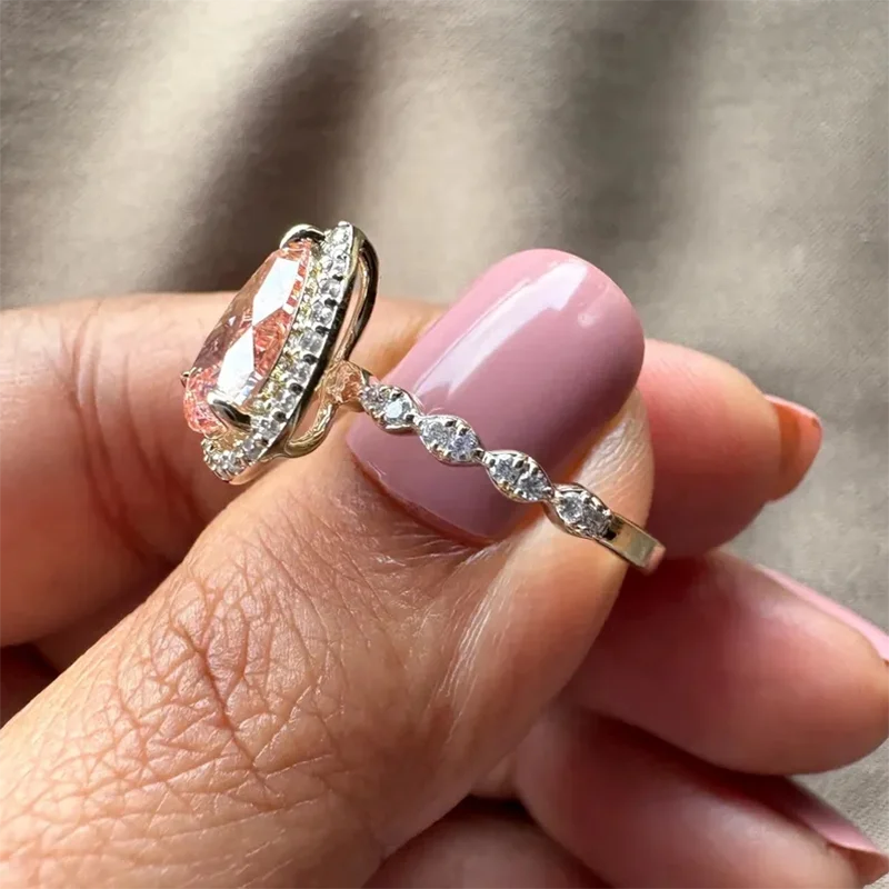 Pear-cut pink lab-grown diamond halo engagement ring