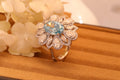 Blue oval lab-grown diamond floral ring