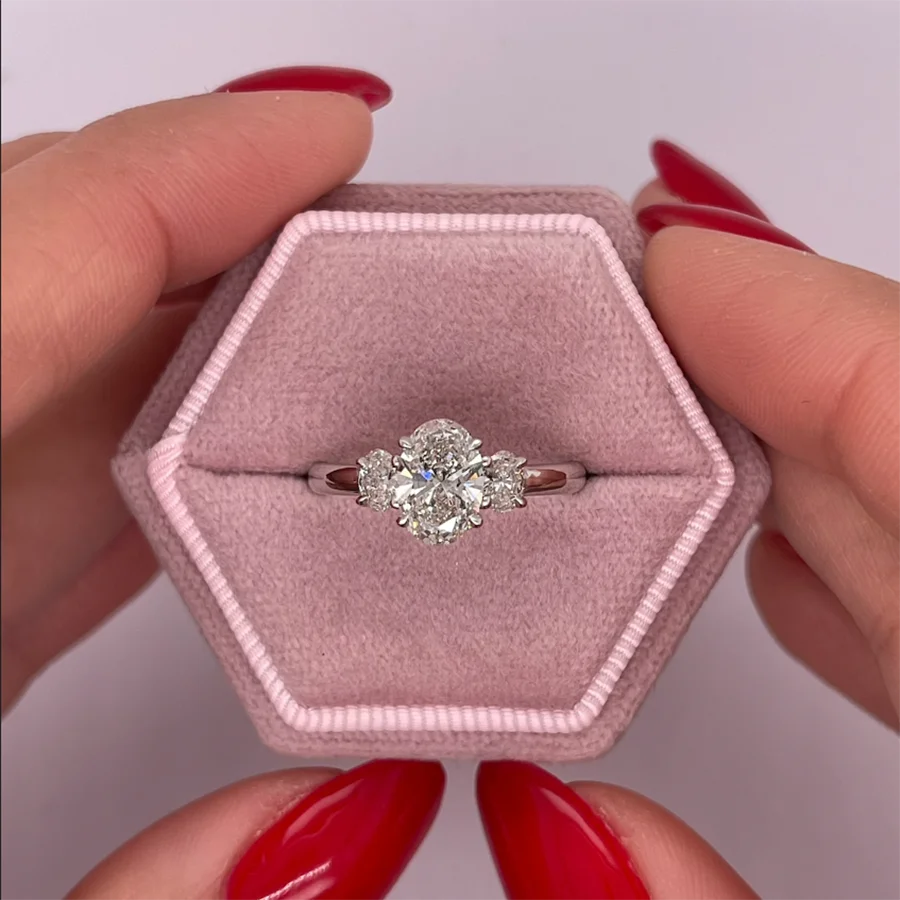 Oval lab-grown diamond three-stone engagement ring