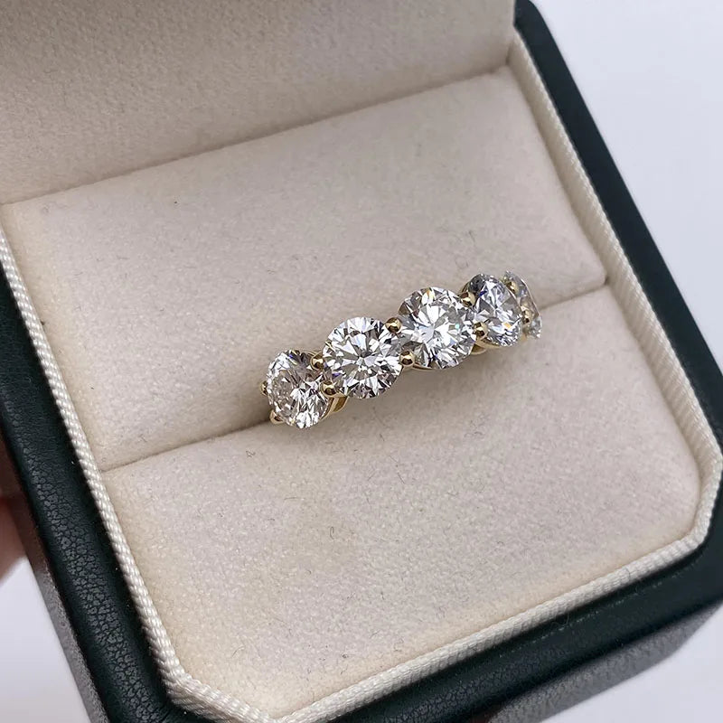 Four carat total weight five-stone diamond band