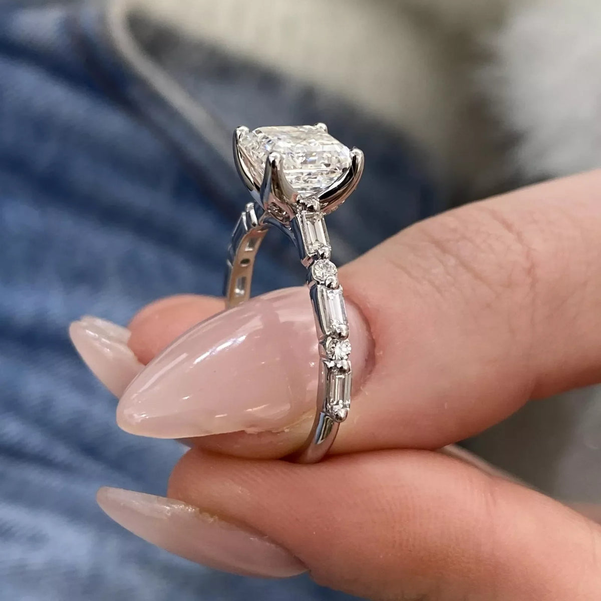 Gold Asscher diamond ring with accent stones