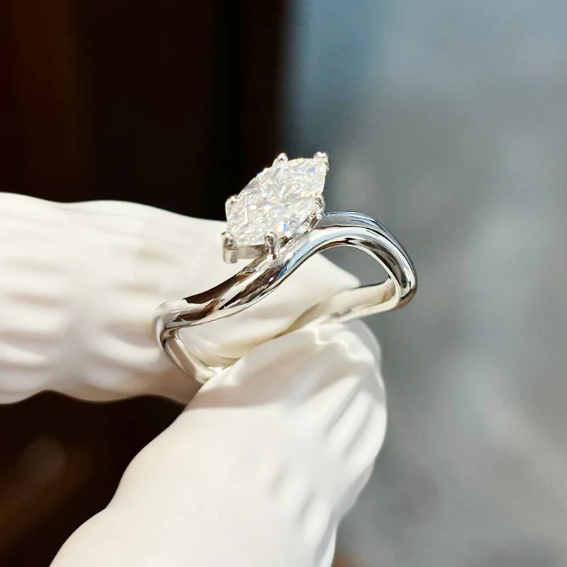 Marquise-cut lab diamond ring with twisting band