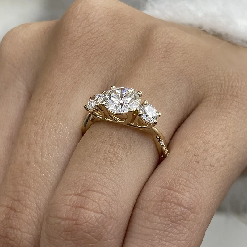 Lab-grown diamond three-stone ring in twisting band design