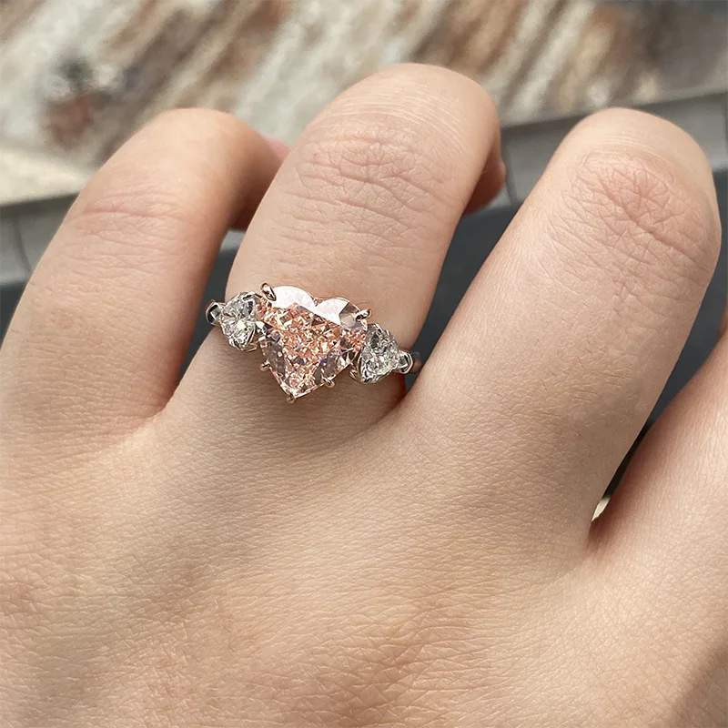 Pink lab-grown diamond heart ring with diamond accents