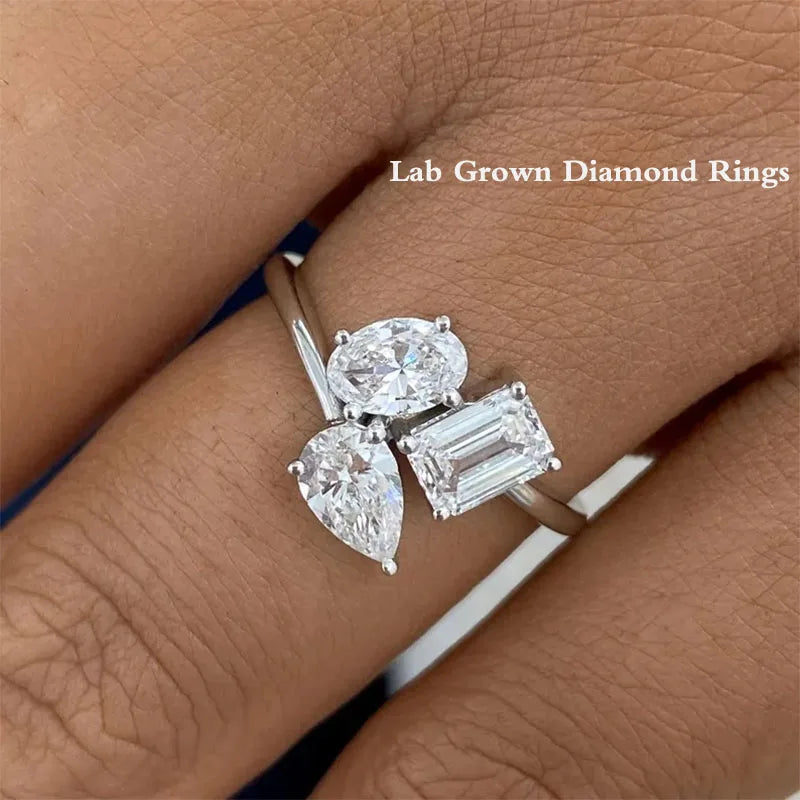 Emerald pear and oval lab-grown diamond cluster ring
