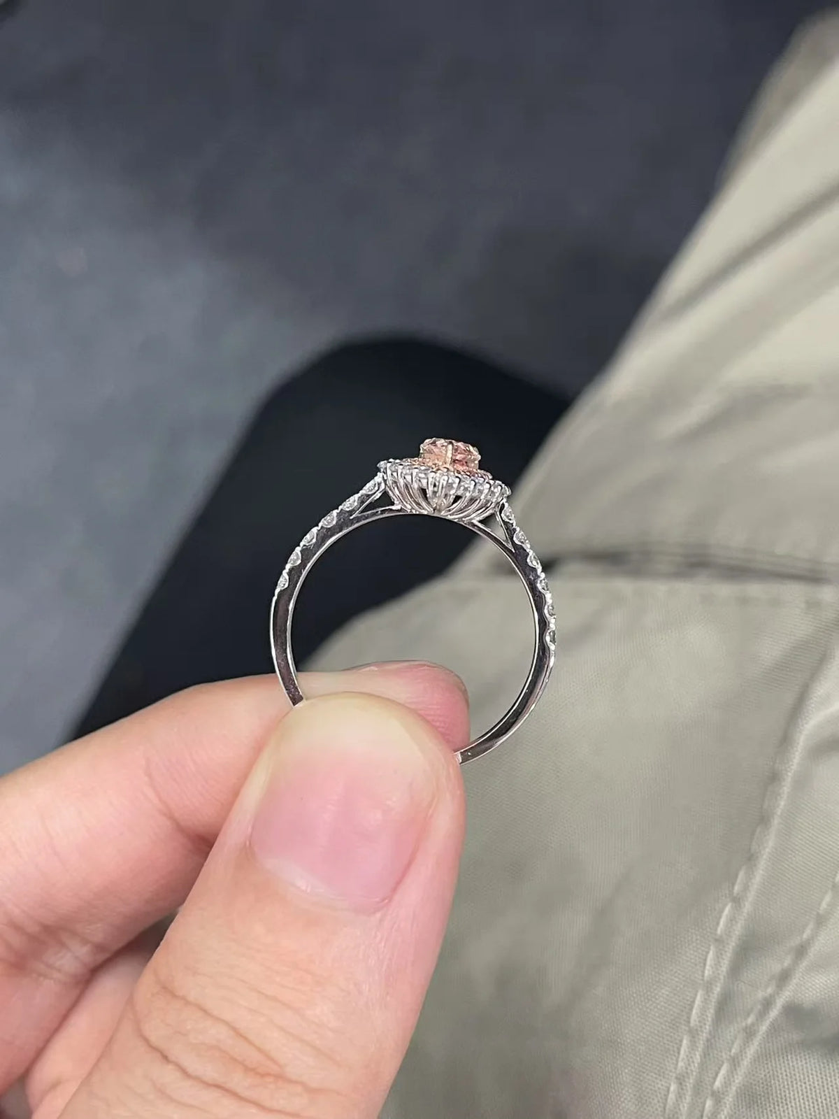 Pink pear-cut diamond ring with accent stones