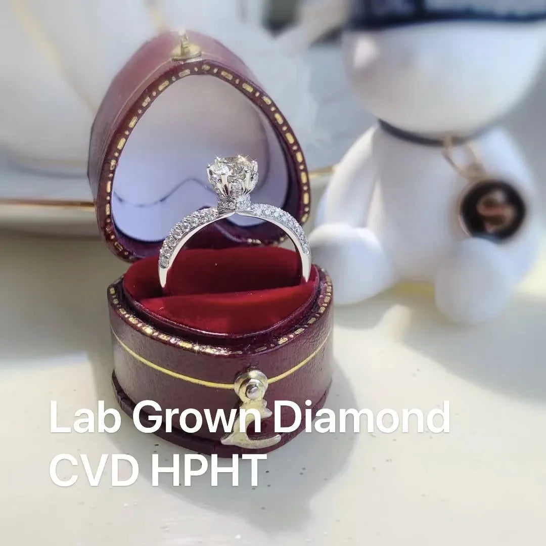 Round lab-grown diamond engagement ring with diamond accents