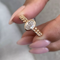 Oval lab-grown diamond bezel-style engagement ring