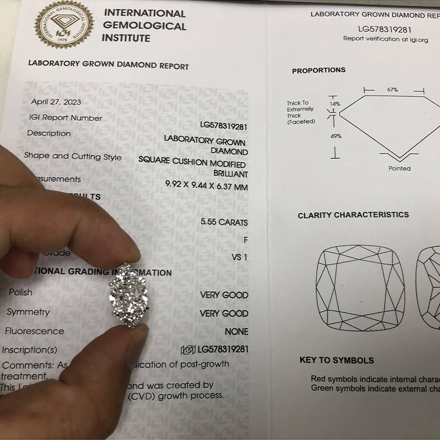 Gold cushion-cut diamond engagement ring with halo