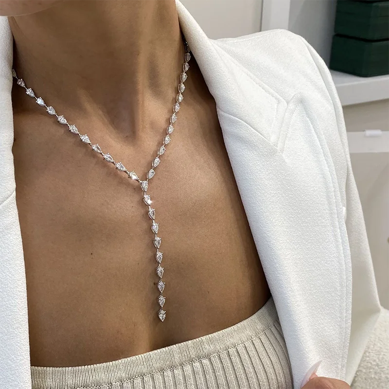 Lariat necklace set with pear-shaped lab diamonds