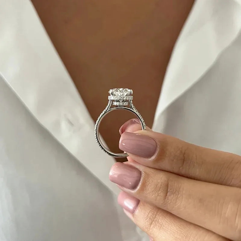 Oval diamond ring with elevated prong setting
