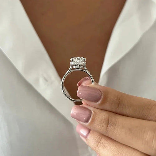 Oval diamond ring with elevated prong setting