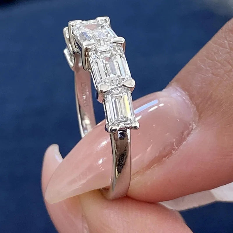Step-cut diamond five-stone ring