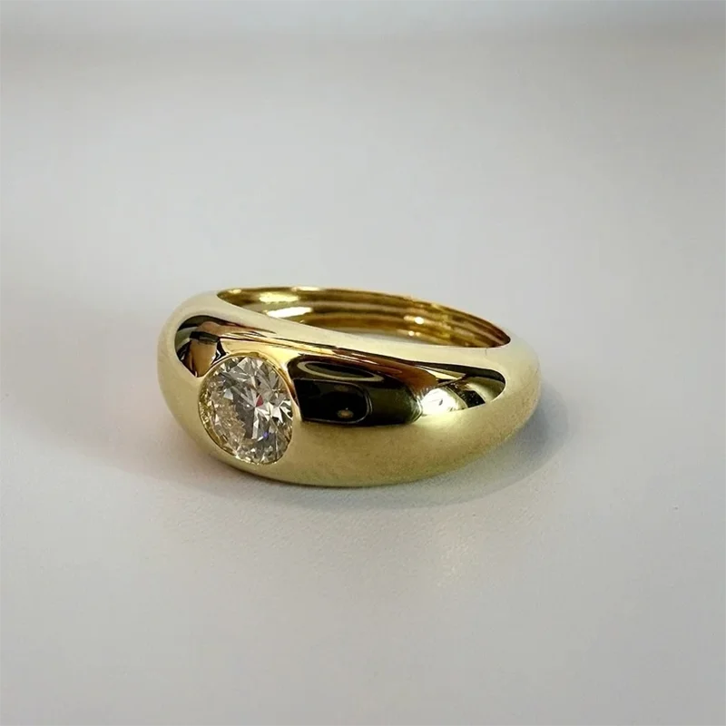 Gold dome band with bezel-set lab-grown diamond