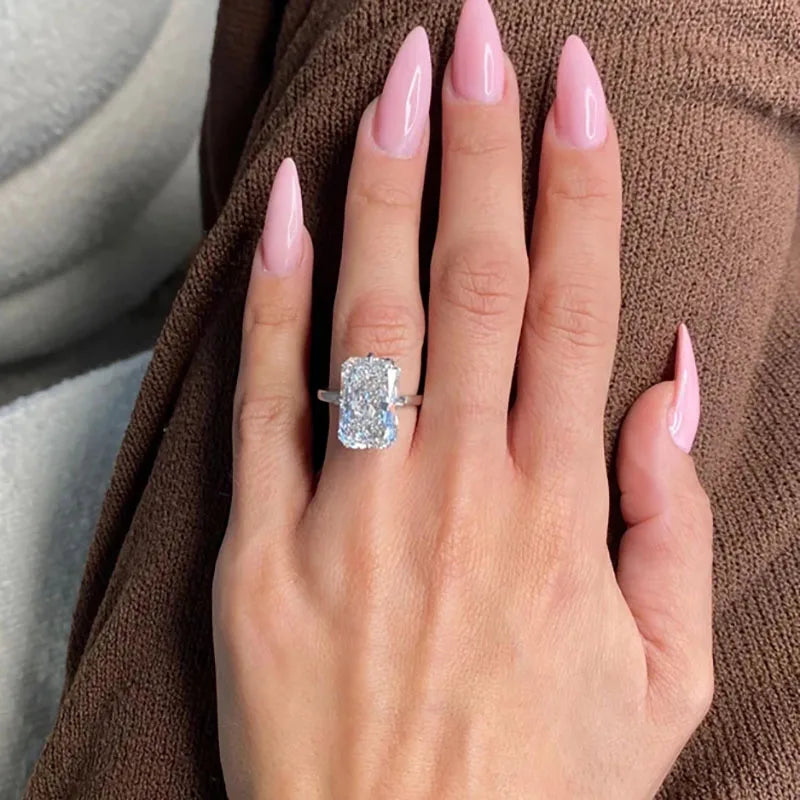 Rectangular radiant-cut diamond engagement ring
