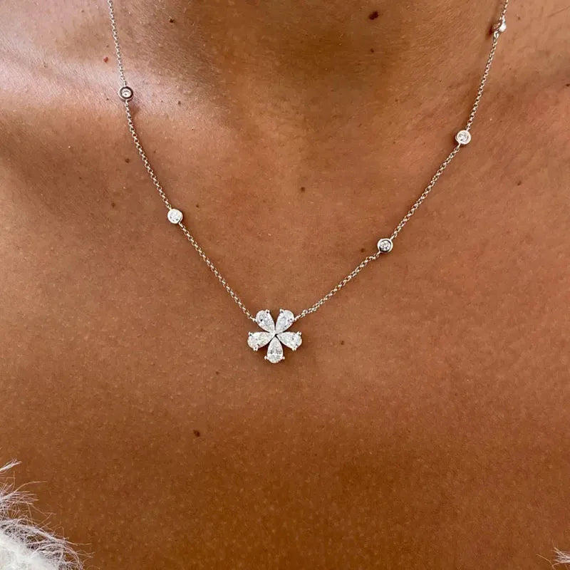Lab-grown diamond cluster pendant with pear and round stones
