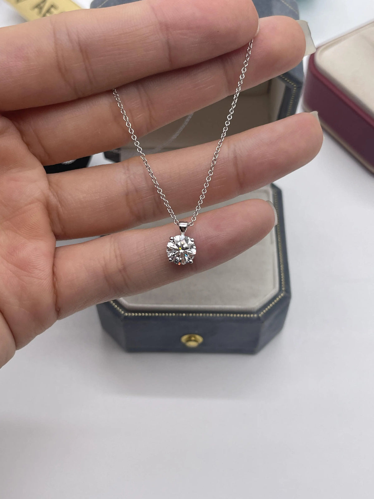 Round diamond solitaire pendant necklace