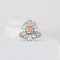 Pink radiant-cut lab-grown diamond ring with side stones